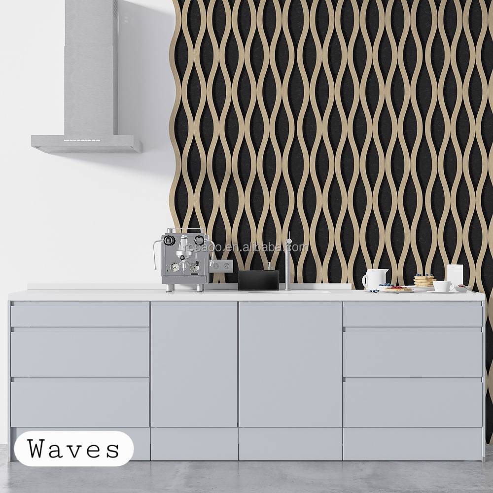 A modern kitchen scene with a white countertop and light gray lower cabinets, set against a black wall covered in a beige wavy pattern. A small espresso machine and cups sit on the counter.