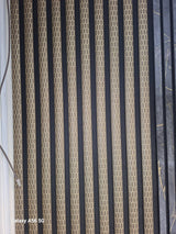 Dark oak honeycomb acoustic panel by Fairmont Home Interiors, 60x240cm, showcasing modern sound-absorbing wall panel design.