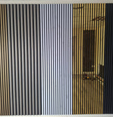 Vertical slat wall panels shown in three color options: black, white, and natural wood, installed on a partition wall in an office interior.