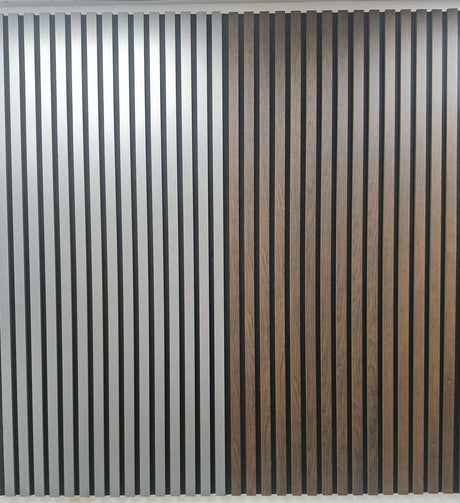 Vertical slatted wall paneling shown in two finishes: a light silver-gray slatted pattern on the left and a medium brown wood-grain slatted pattern on the right, installed against an interior wall.