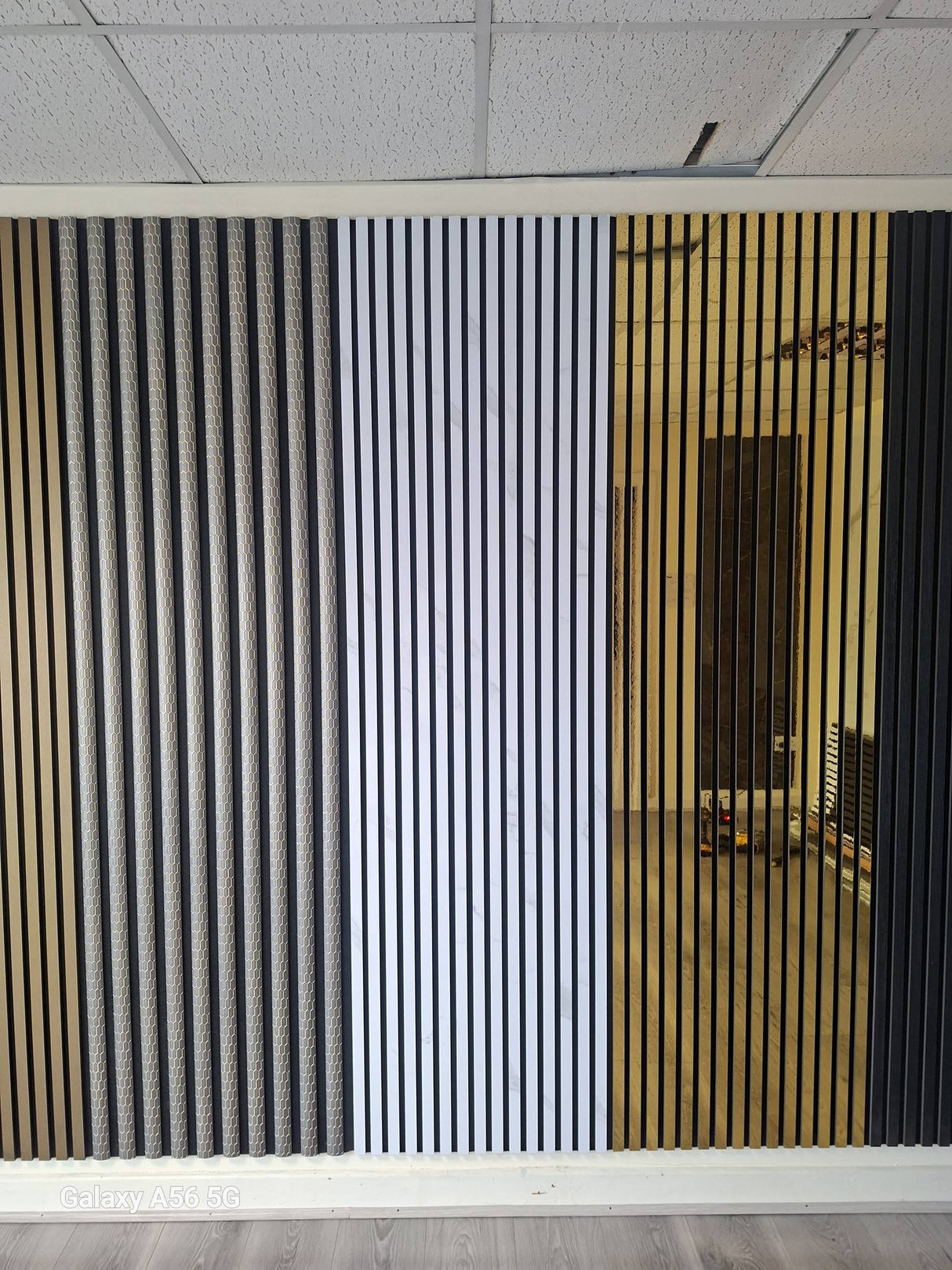 White marble effect acoustic wall panel by AWS, 60x280cm, with fluted design for elegant sound insulation.